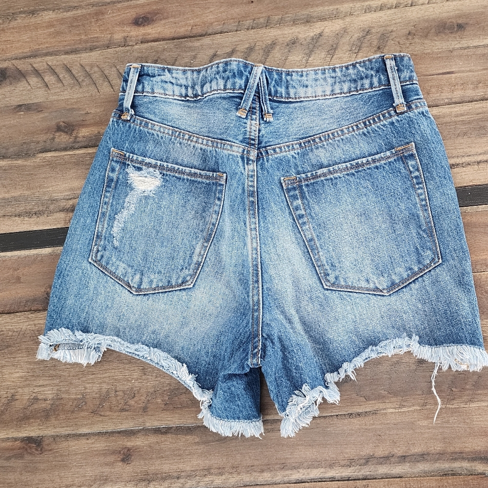 Good American Distressed Bombshell cutoff shorts - Picture 2 of 5